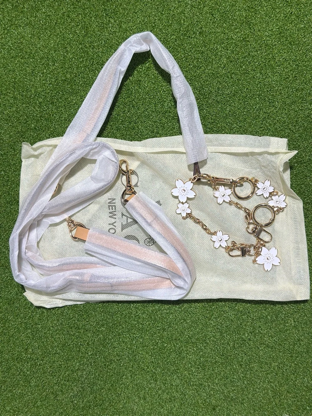 Coach Beige Signature Canvas Crossbody with Floral Charm